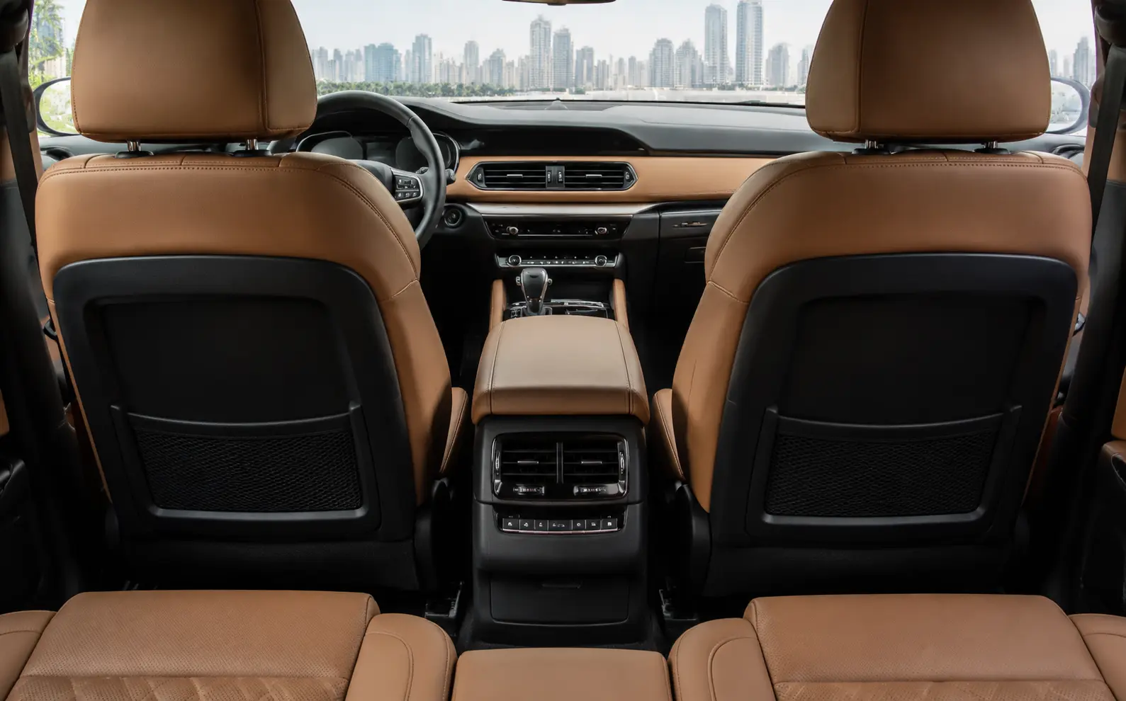 SUV interior showing rear air vents and multi-zone cabin cooling layout