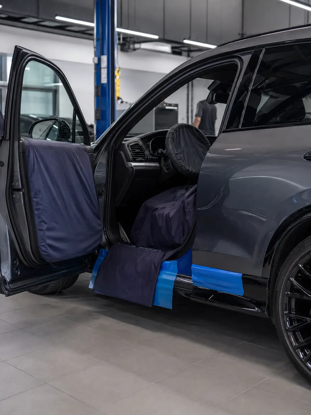 Premium vehicle with seat and sill protection in a Dubai workshop